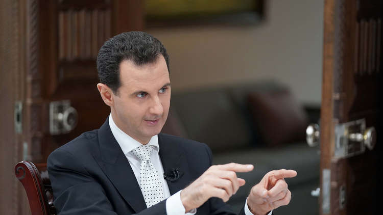 الأسد يوضح قانون 