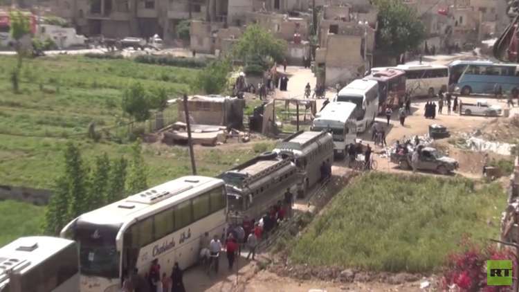 المسلحون يخرجون من بلدات جنوب دمشق