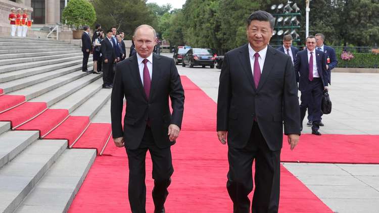 بوتين وشي يتفقان على تعزيز حضور الروبل واليوان في المبادلات التجارية