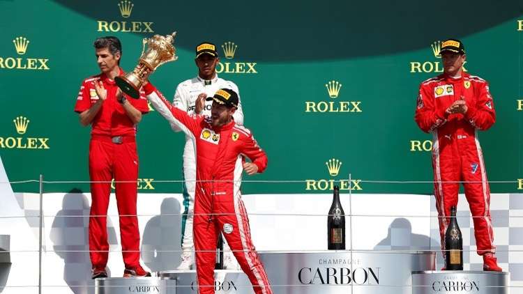 شاهد.. فيتل يتوج بجائزة بريطانيا الكبرى