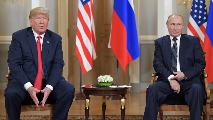 كيف تقرأ هذه الصورة بين ترامب وبوتين؟