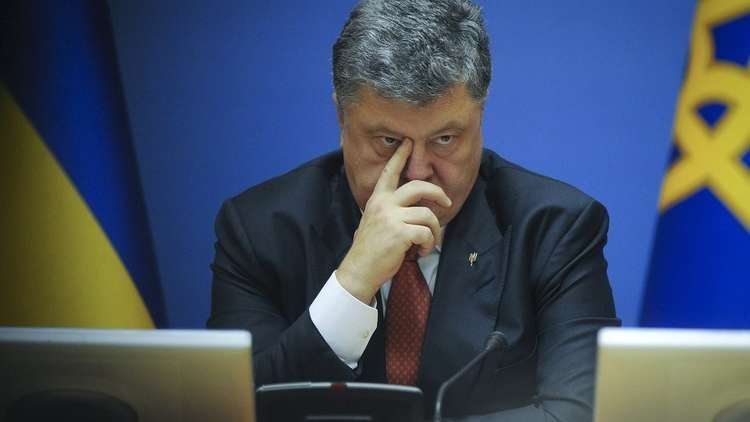 لماذا أعلنت أوكرانيا الأحكام العرفية وهل يسعى بوروشينكو لإلغاء الانتخابات؟