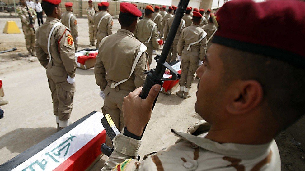 بالصور.. العراق وإيران يتبادلان رفات 90 جنديا