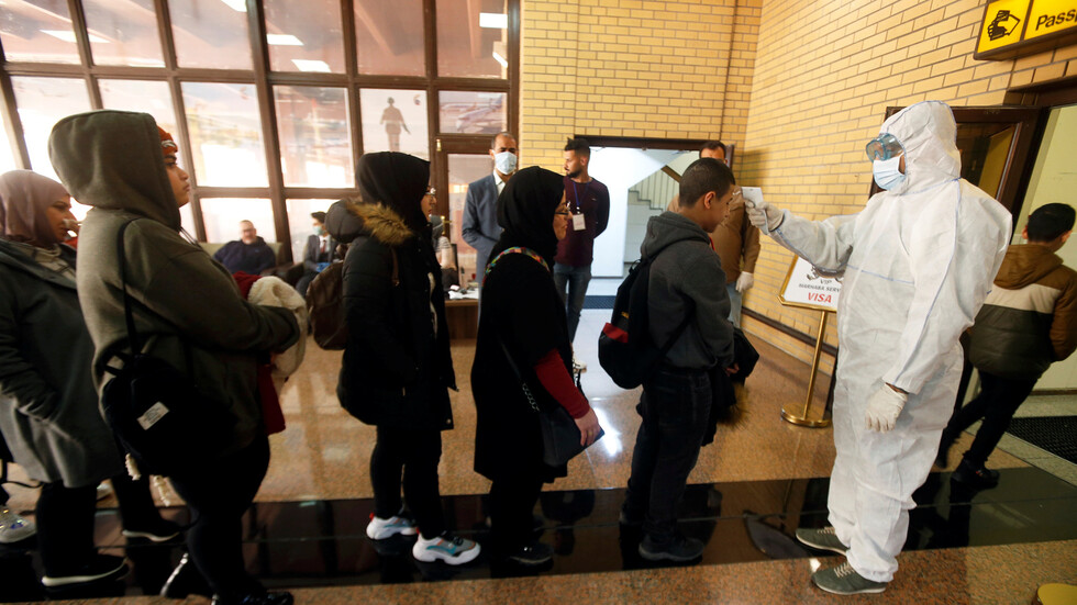 عودة الرعايا العراقيين من الصين إلى بغداد (صور)