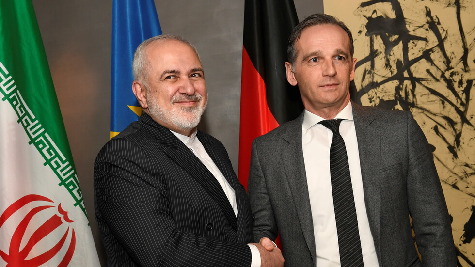 ظريف يعود من ألمانيا رفقة إيراني احتجزته برلين بسبب العقوبات الأمريكية