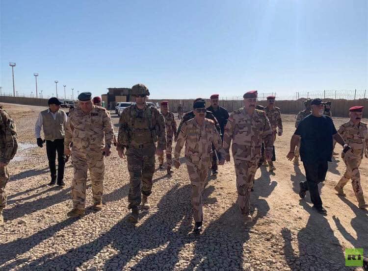 بالصور.. التحالف الدولي ينسحب من قاعدة القائم العراقية