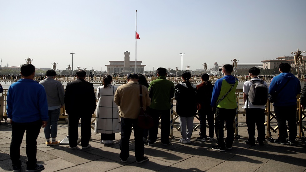 حداد عام في الصين على ضحايا كورونا (صور)