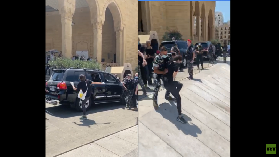 محتجون يعترضون موكب الحريري في وسط بيروت (فيديو)