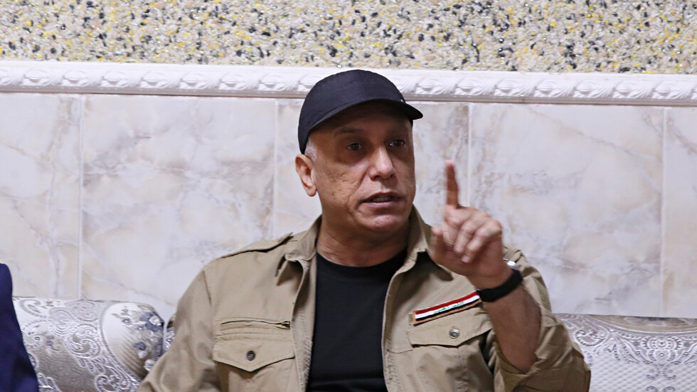 رئيس حكومة العراق يضبط الميزان