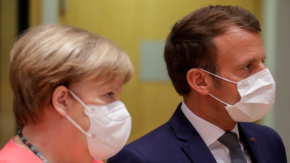 ماكرون وميركل يدعوان إلى دعم فكرة معاهدة دولية لمنع الجوائح