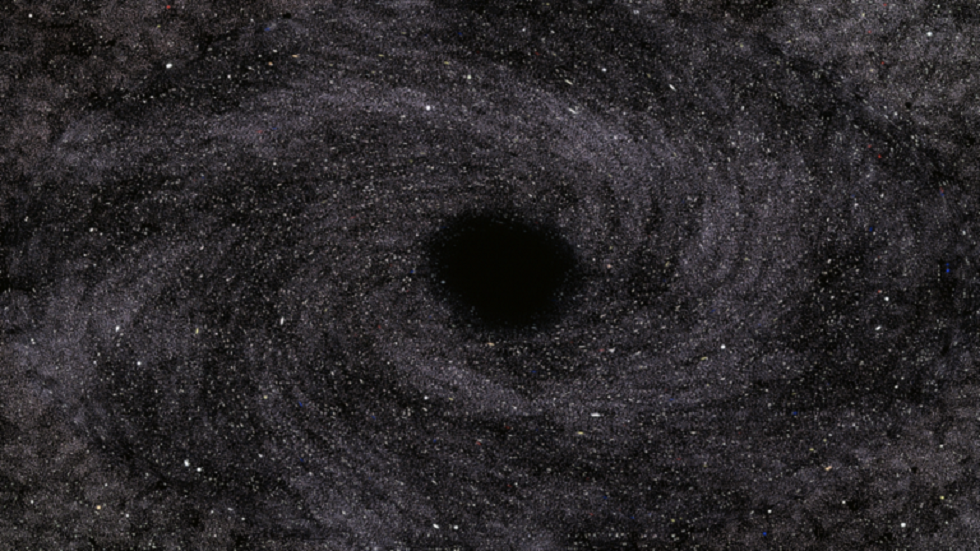 رسم توضيحي يظهر نجما يلتهمه ثقب أسود في حدث مذهل!