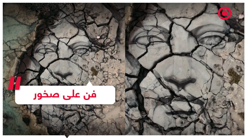 شاب يرسم على تكوينات صخرية