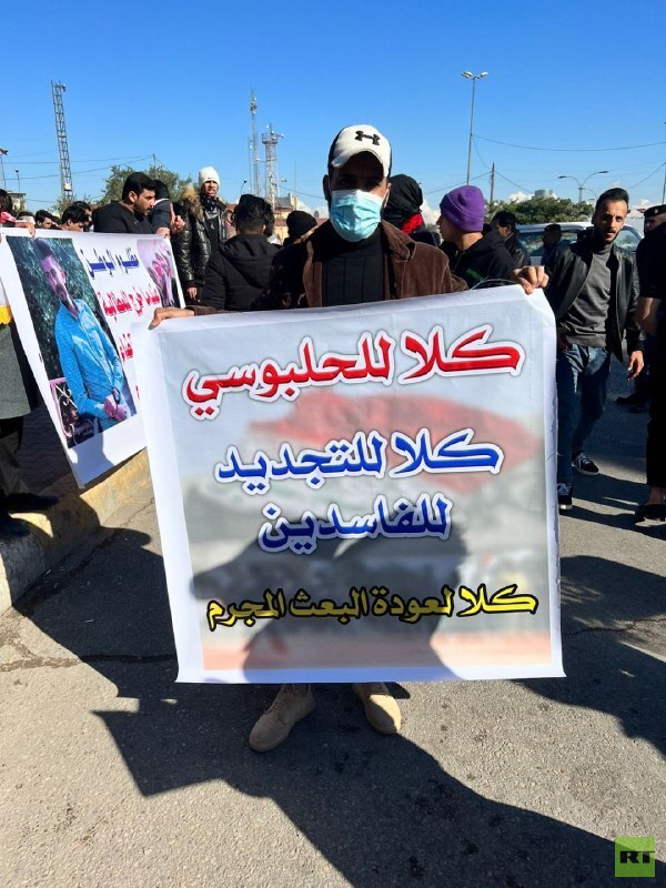 تظاهرة في بغداد تطالب بمحاكمة المالكي وترفض التجديد للرئاسات الثلاث (صور)