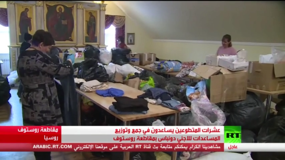 عشرات المتطوعين يشاركون بمساعدة لاجئي دونباس