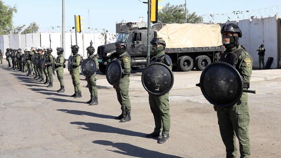 القوات الأمنية العراقية تلقي القبض على 22 متهما في نزاع عشائري