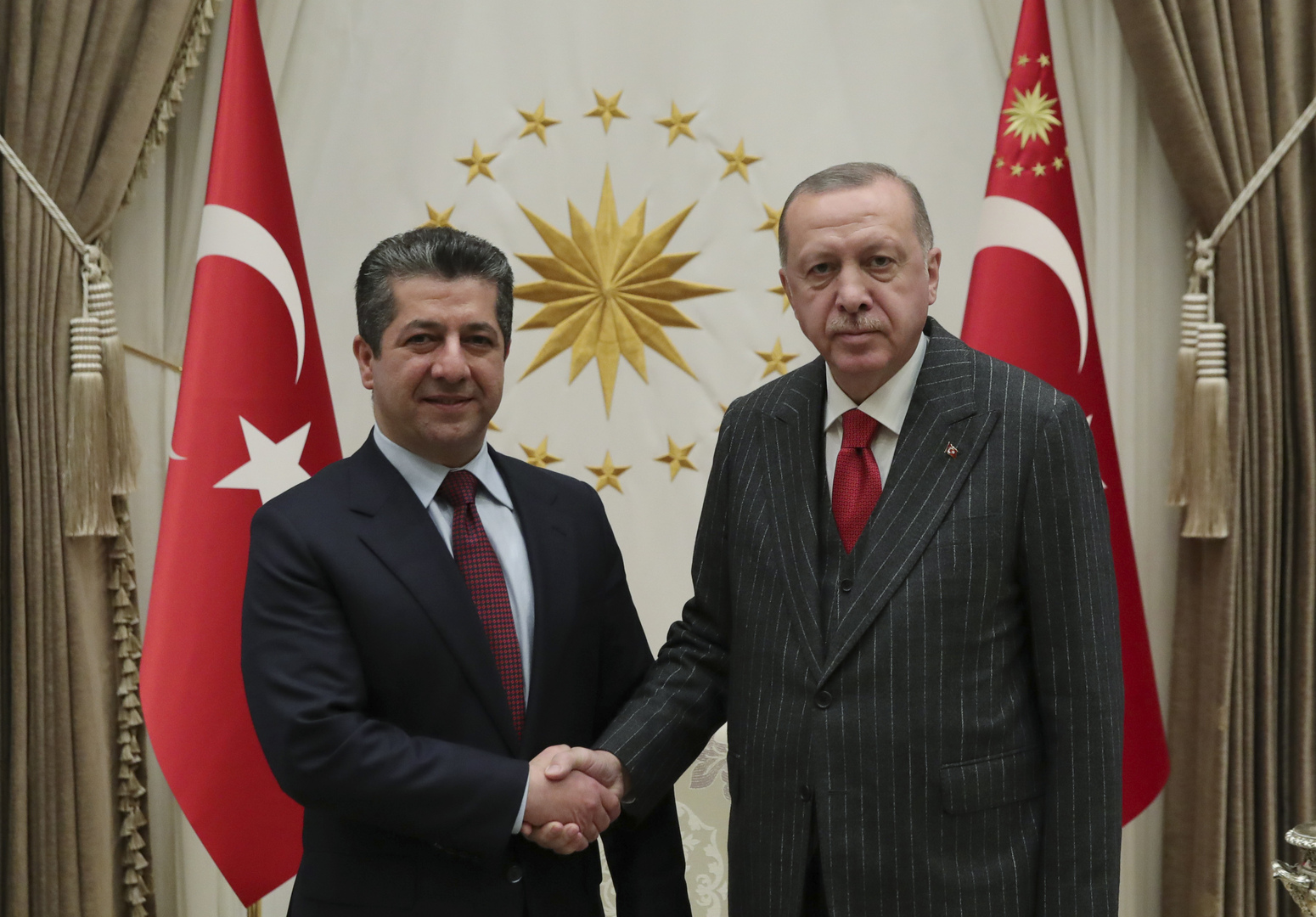 الرئيس التركي رجب طيب أردوغان، مع رئيس حكومة إقليم كردستان العراق، مسرور بارزاني.