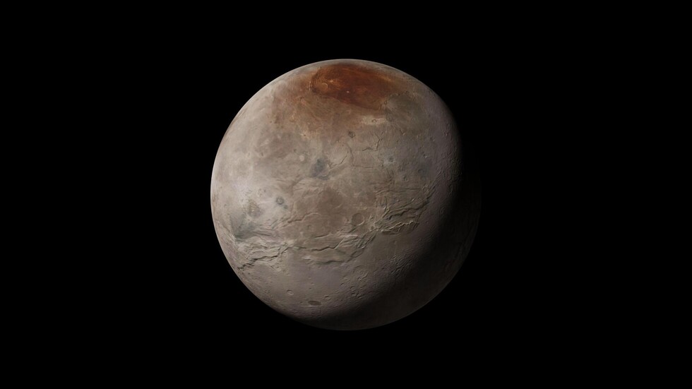 العلماء يقدمون تفسيرا جديدا لاحمرار القطب الشمالي لقمر بلوتو "شارون"