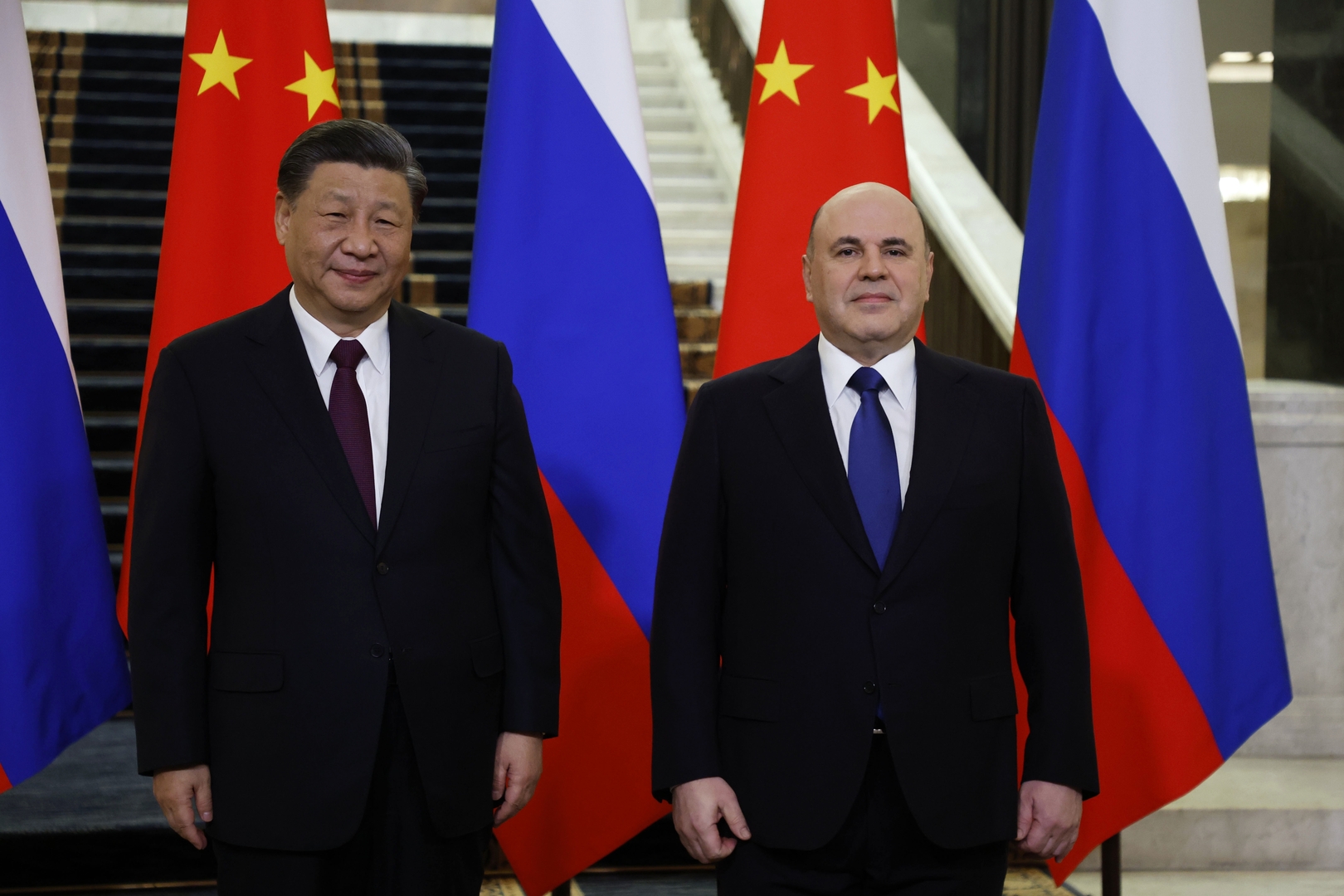 رئيس الوزراء الروسي ميخائيل ميشوستين والرئيس الصيني شي جين بينغ