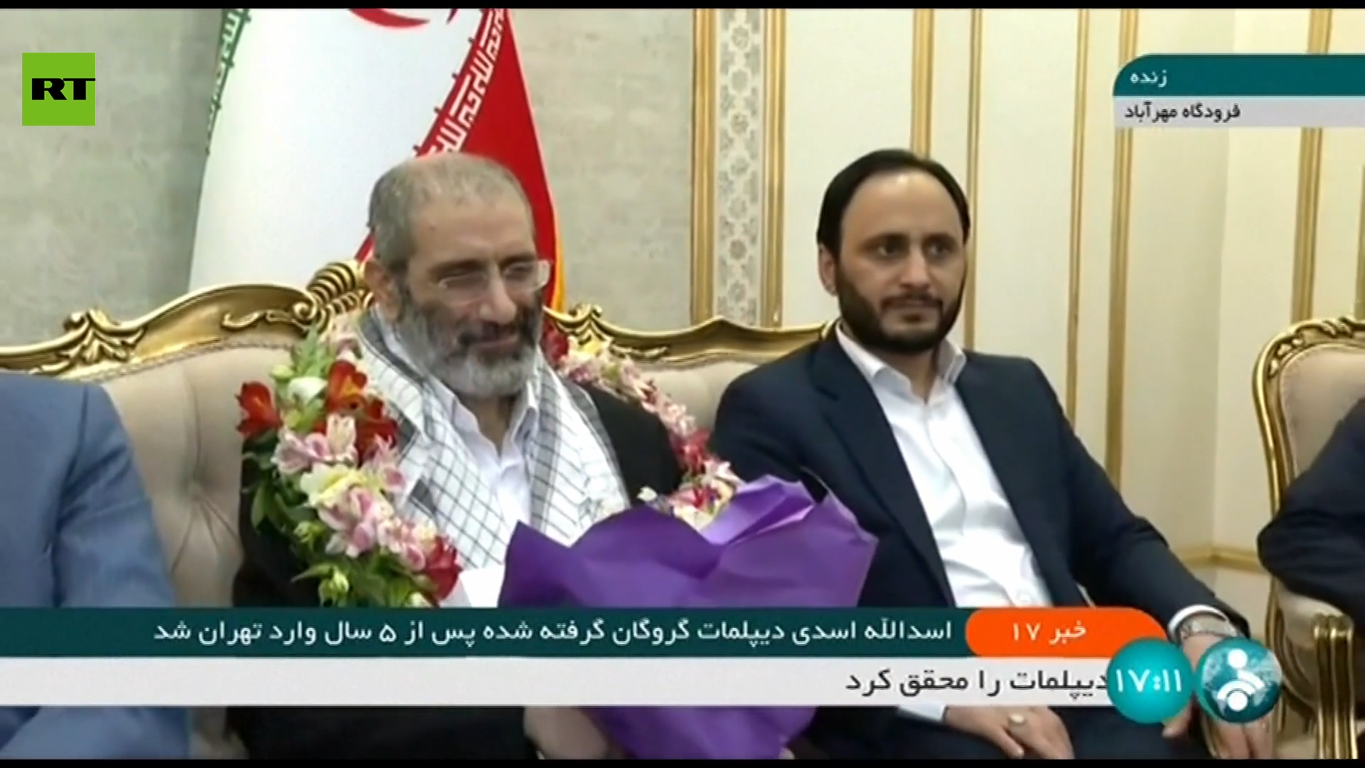 استقبال الدبلوماسي الإيراني أسد الله أسدي في مطار طهران بعد تبادل السجناء مع بلجيكا استقبال الدبلوماسي الإيراني أسد الله أسدي في مطار طهران بعد تبادل السجناء مع بلجيكا