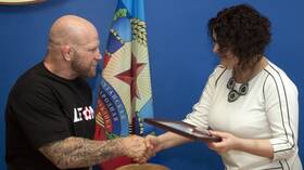 المقاتل الروسي مونسون: أشعر بالسعادة بعد أن تخليت عن الجنسية الأمريكية