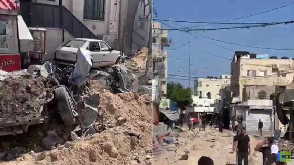 فلسطينيون يتفقدون الدمار في ساحة مخيم جنين (فيديو)