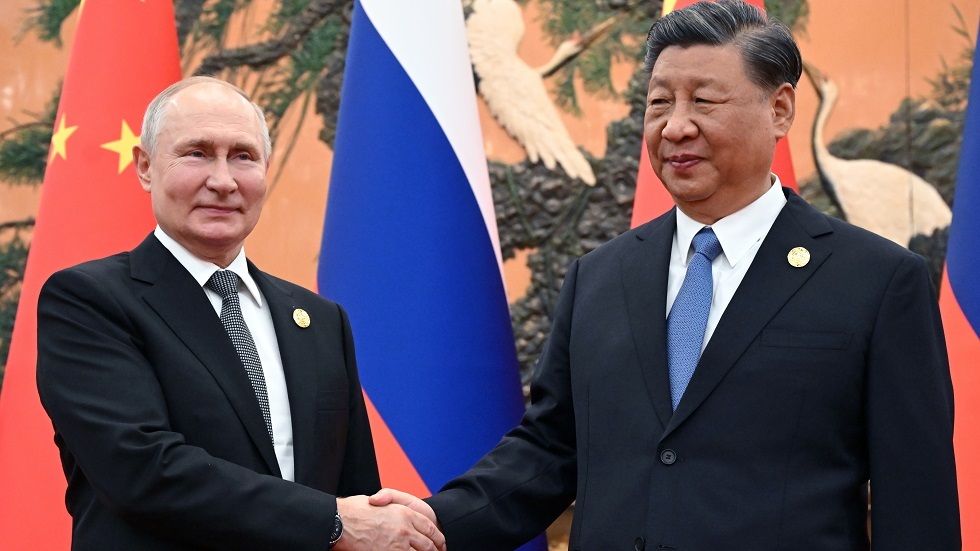 الرئيسان الروسي فلاديمير بوتين والصيني شي جين بينغ (منتدى التعاون الدولي الثالث 