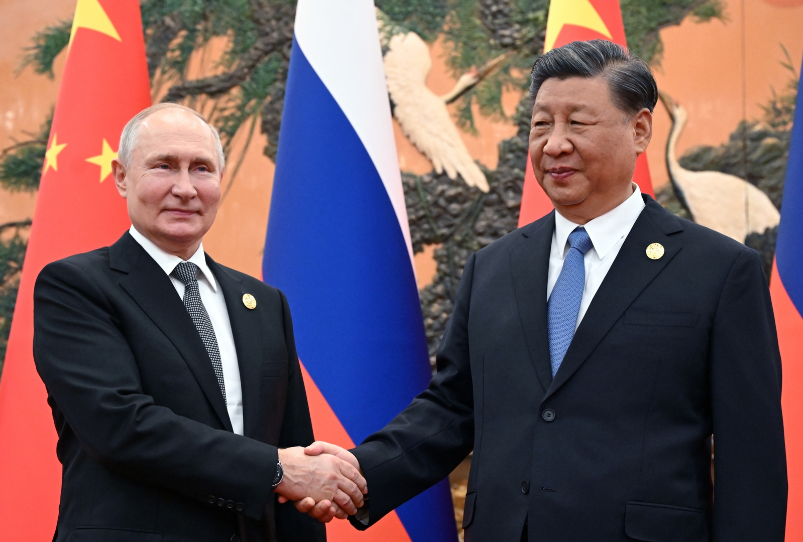 رئيسا روسيا والصين في منتدى 