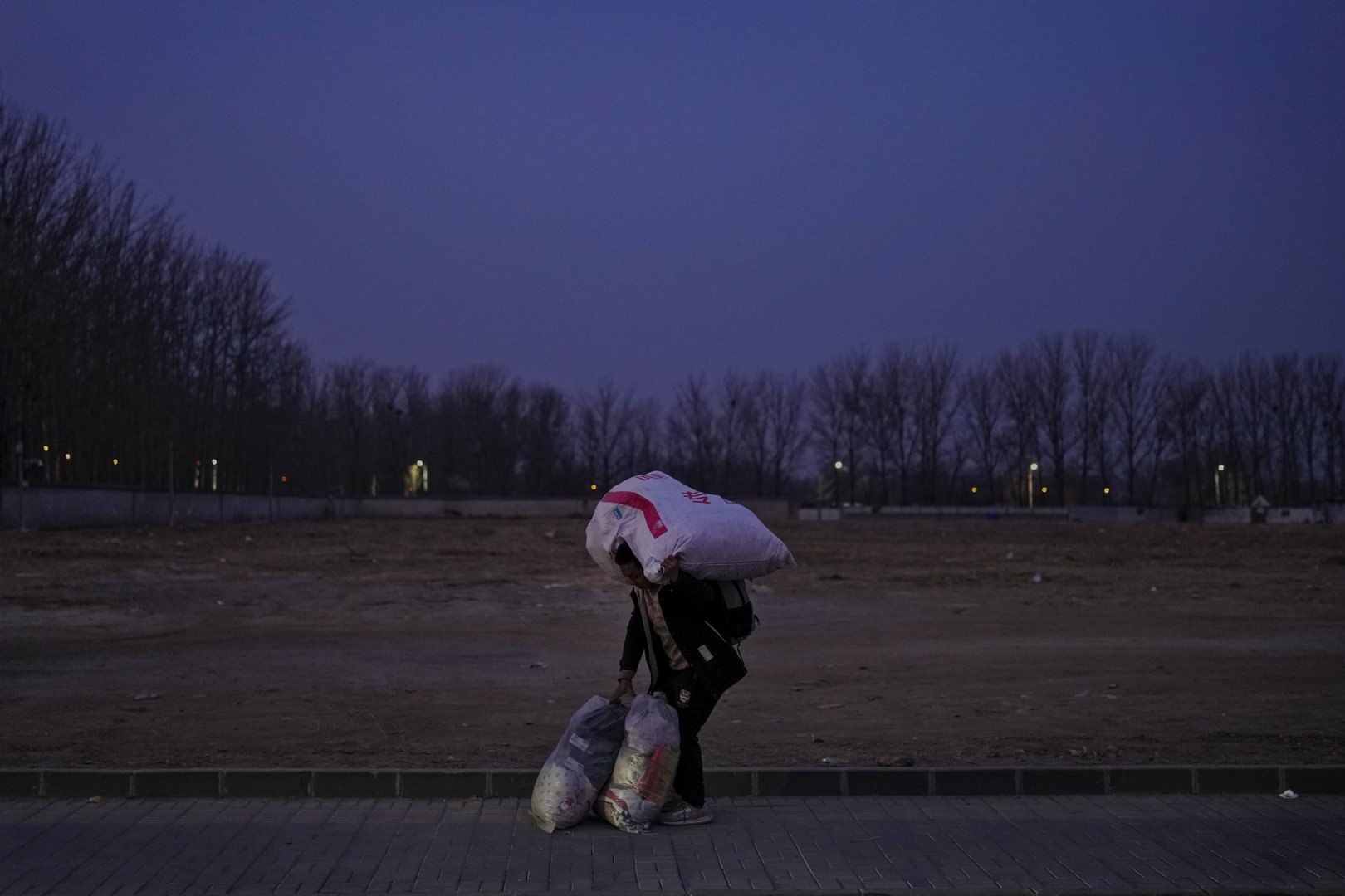 الثلوج تعيق سفر الصينين خلال احتفالات السنة القمرية