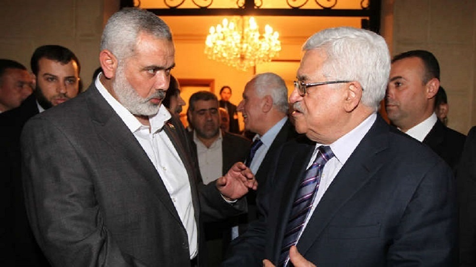 الرئيس الفلسطيني محمود عباس ورئيس المكتب السياسي لحركة حماس إسماعيل هنية