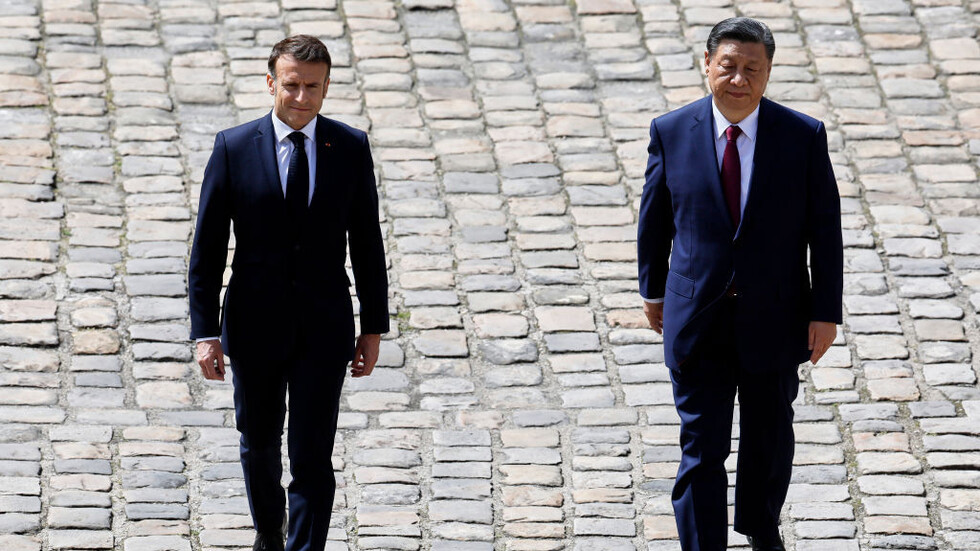 شي جين بينغ وماكرون يؤكدان على ضرورة الحل السلمي للملف النووي الإيراني