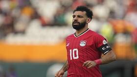 محمد صلاح يوجه رسالة لزميله أحمد فتحي (صورة)