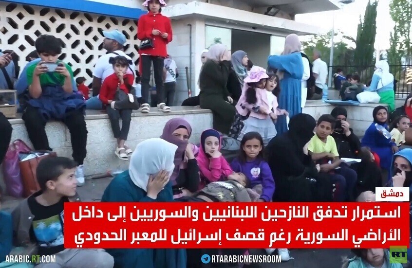 آلاف النازحين اللبنانيين يفرون إلى سوريا