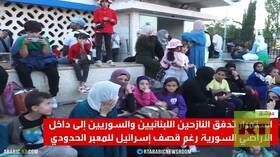 آلاف النازحين اللبنانيين يفرون إلى سوريا