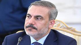 فيدان يدعو إلى أخذ تحذيرات الرئيس الروسي بعين الاعتبار