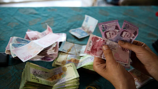تحسن سعر صرف العملة السورية