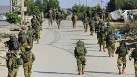 إسرائيل تعزز قواتها في الضفة الغربية عشية بدء تنفيذ اتفاق تبادل الأسرى