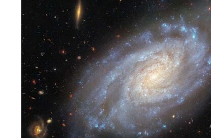 تلسكوب هابل يلتقط صورا عالية الدقة لمجرة حلزونية في كوكبة الأسد (صور)
