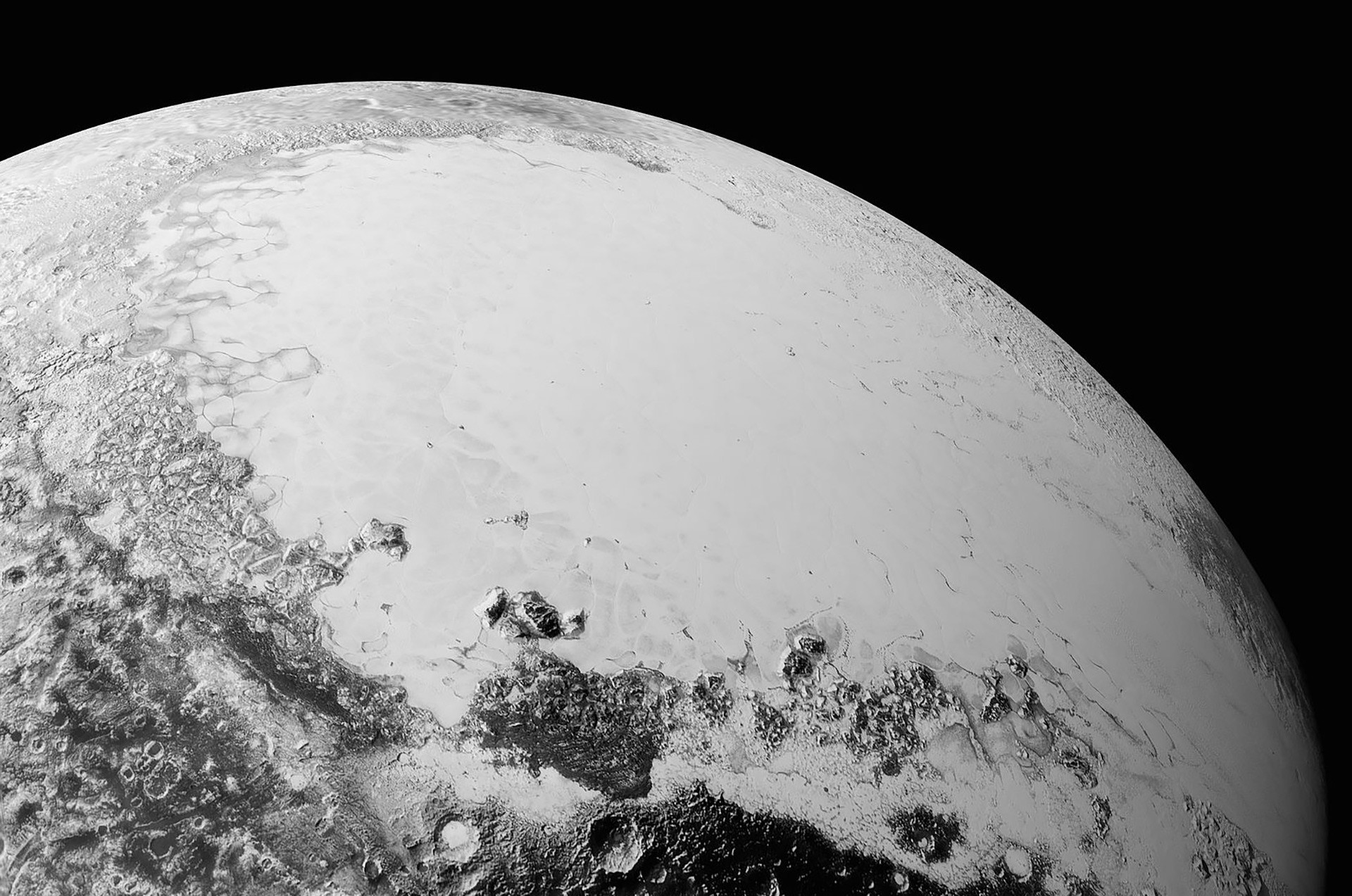 Sputnik Planitia, ledeni krater na Plutonu, ki je bil poimenovan po umetnem satelitu.