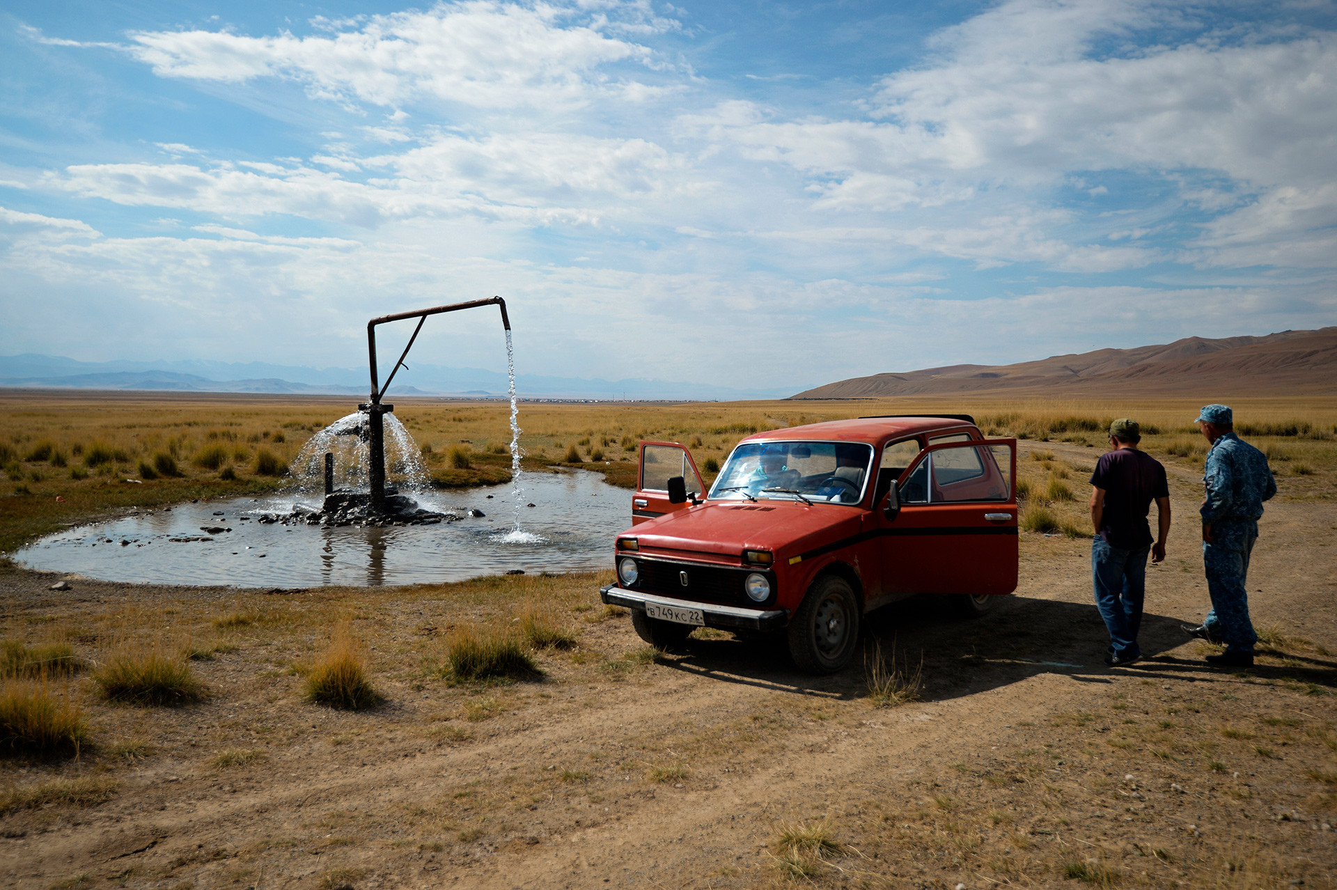 Niva stands next to an artesian well in Altai 