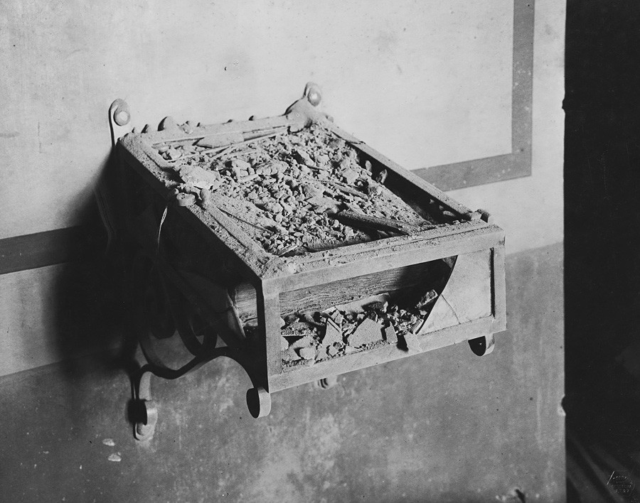 Broken display case with the gospel of Mistislav in the Patriarch’s Vestry after the bombardment of the Moscow Kremlin. Photograph by P.P. Pavlov. Nov. 14 , 1917.
