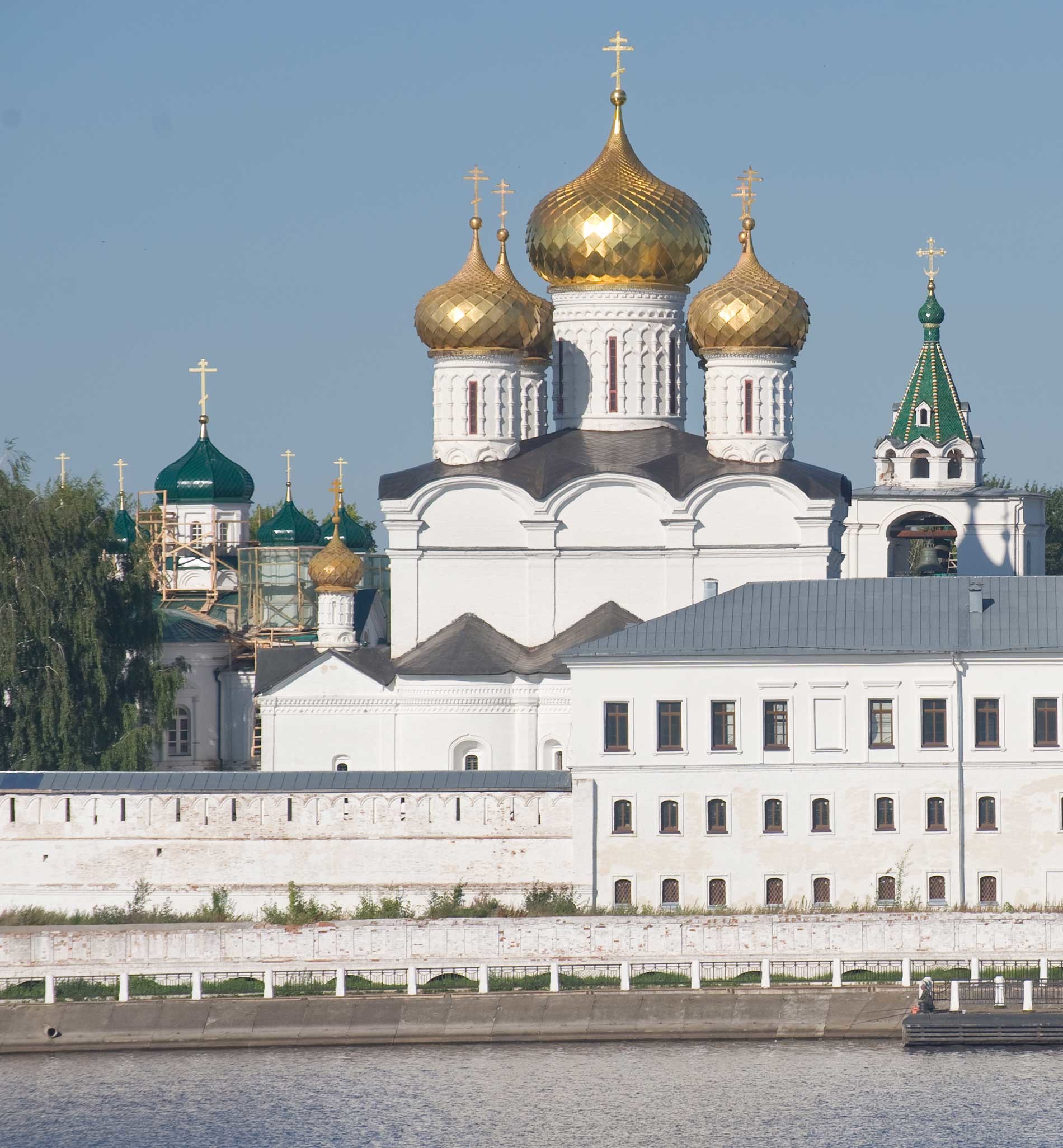 Trinity-Ipatiev Monastery. From left: Cathedral of Nativity of the Virgin; Trinity Cathedral; bell tower. East view across Kostroma River. Aug. 13, 2017.