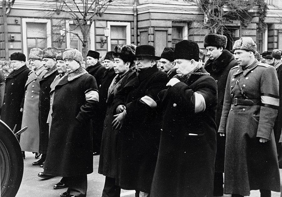 The middle row, from right to left: Nikita Khrushchev and Lavrentyi Beria among other officials at the funeral procession of Josef Stalin