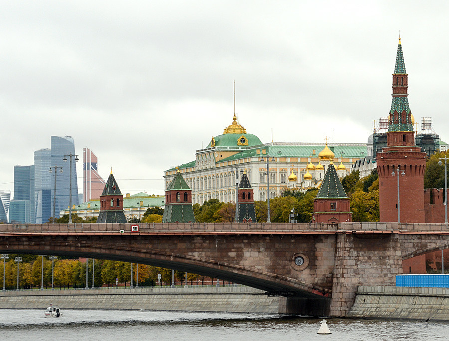 Grand Kremlin Palace can be seen behind the towers and walls of the Kremlin