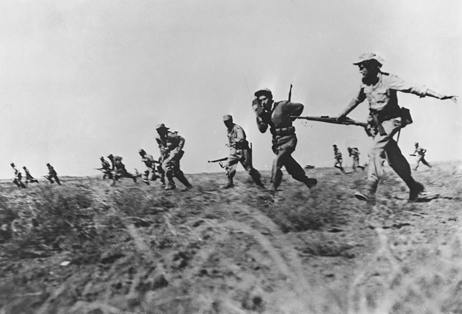 Israeli infantry making a full assault on Egyptian forces in the Negev area of Israel during the War of Independence.