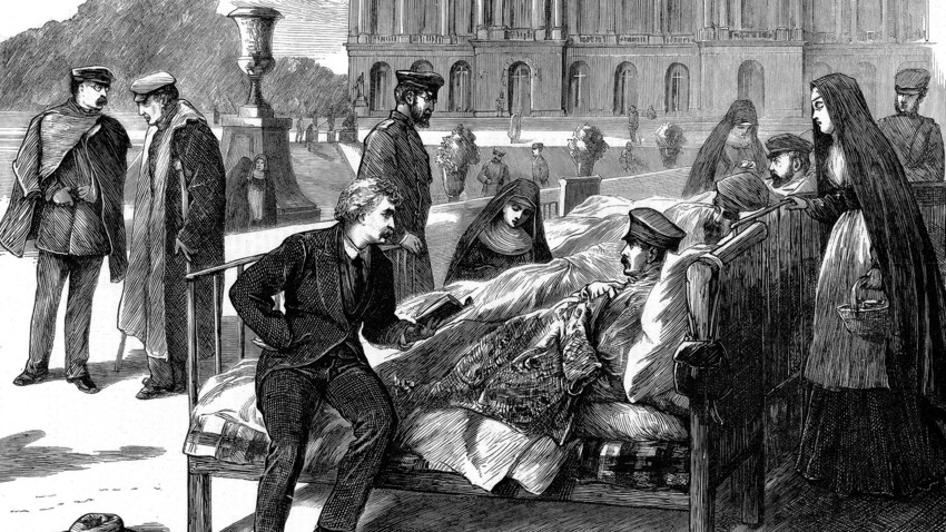 Daniel Home reading to wounded German officers in the military hospital at Versailles. Franco-Prussian War, 1870. From The Graphic. (London, 26 November 1870).