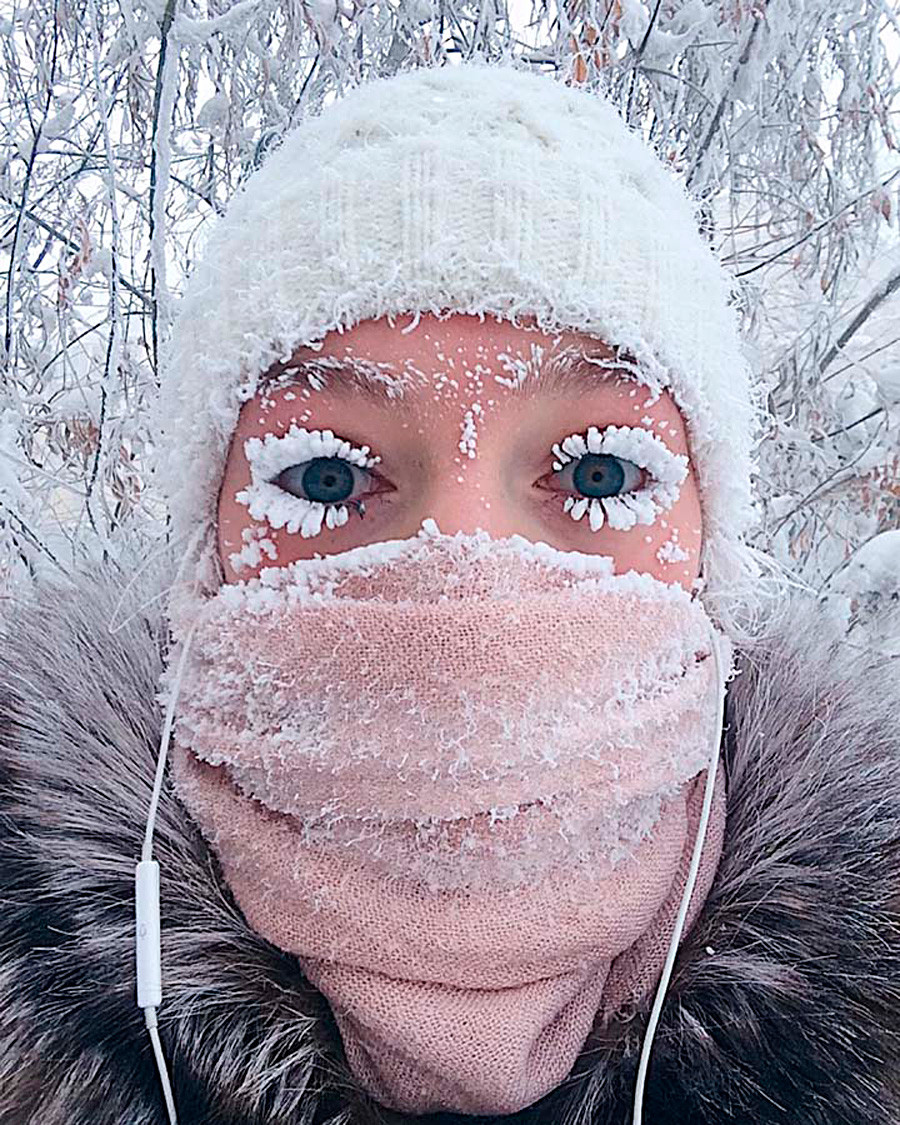 Sub-zero temperatures freeze girl's eyelashes in Siberia - Russia