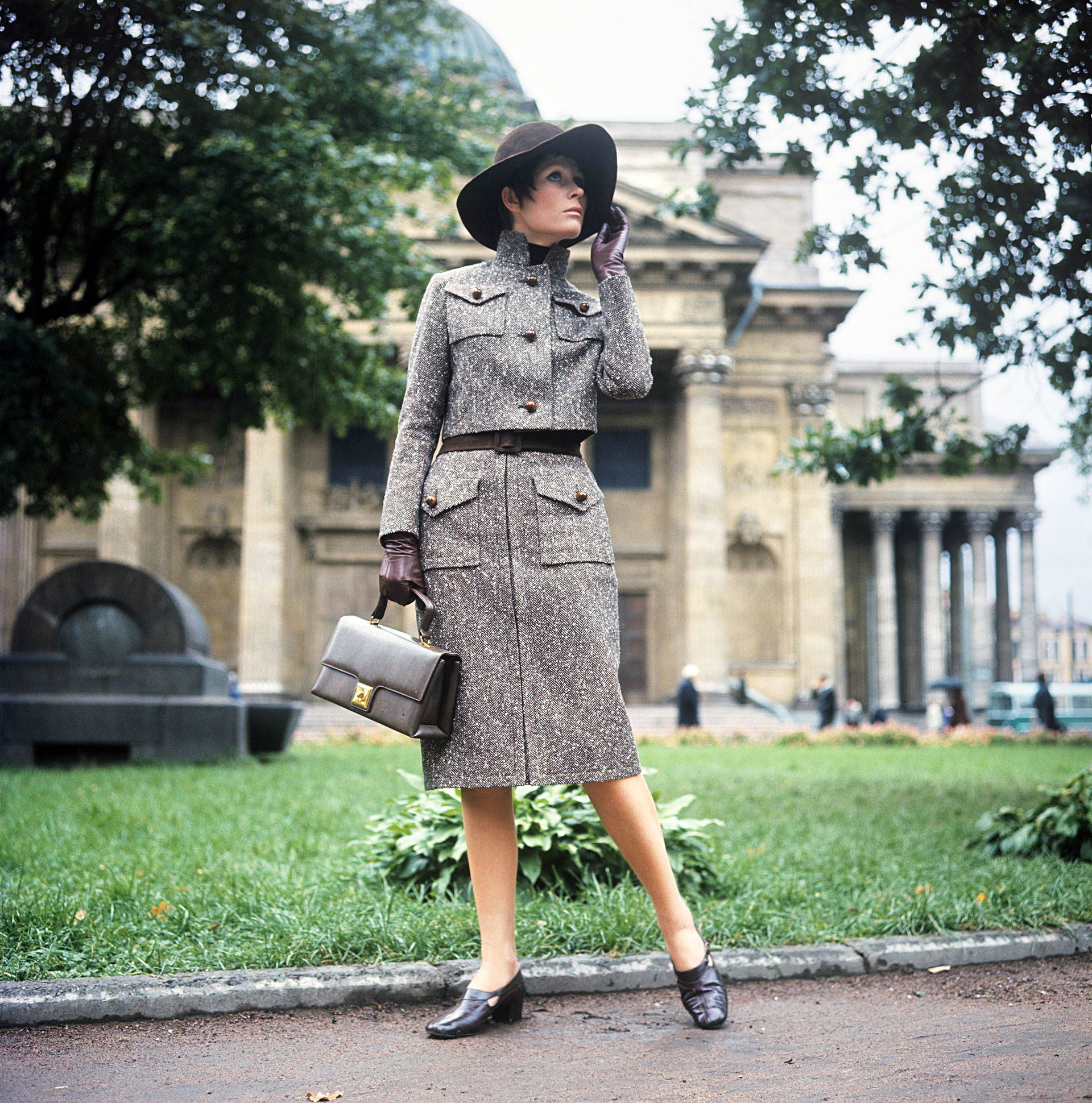 Tweed suit with extended skirt and short waist jacket, 1970