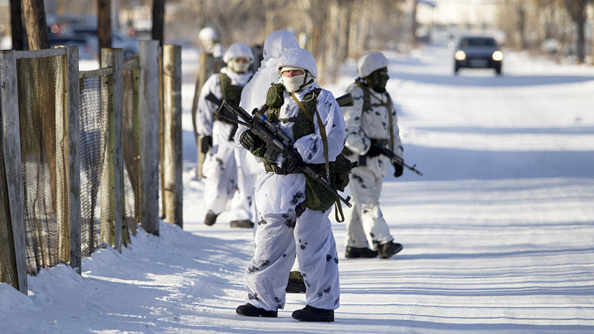 Law enforcement officers stand guard near a local school, after a student with an axe attacked schoolchildren and a teacher in the city of Ulan-Ude, Russia January 19, 2018