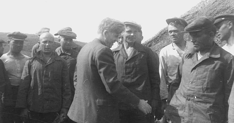 Wallace meeting workers in Kolyma gold mine, likely to be NKVD officers in disguise, May 1944.