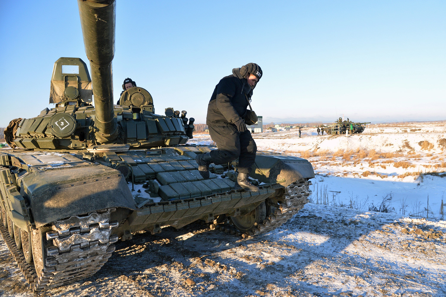 The T-80 tank at the Chebarkul shooting range outside Chelyabinsk during a demonstration session of the newly formed 90th Vitebsk-Novgorod two-times Red Banner guards tank division.